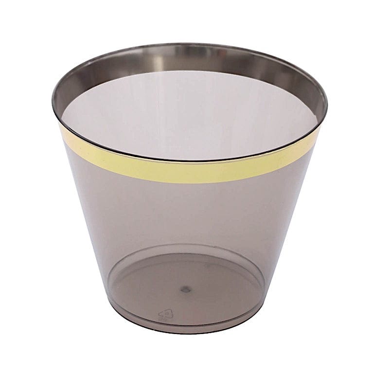 https://leilaniwholesale.com/cdn/shop/files/25-crystal-black-9-oz-plastic-cups-with-gold-rim-disposable-tableware-plst-cu0036-blkgd-30808464392255_1024x1024.jpg?v=1686331860