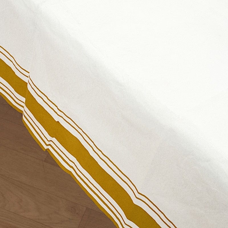 50" x 108" Airlaid Paper Rectangular Tablecloth with Gold Striped Border - White TAB_DSP_002_50108_WHGD