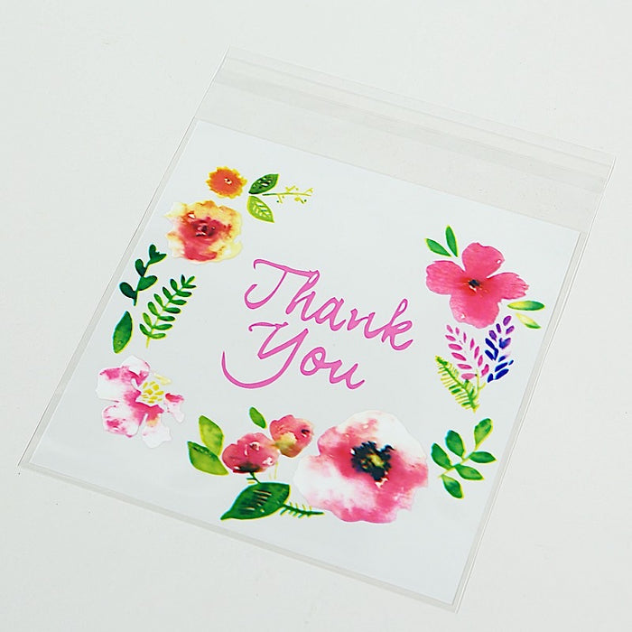 100 PVC Cookie Candy Bags With "Thank You" Floral Print - Clear and White