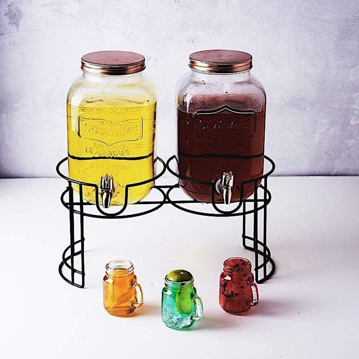 https://leilaniwholesale.com/cdn/shop/products/2-pcs-2-gallons-jar-glass-beverage-dispensers-set-with-spigot-and-stand-clear-and-gold-disp-glas01-1-clr-15814341427263_700x700.jpg?v=1629344598
