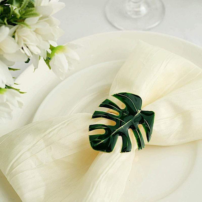 4 Metallic Napkin Rings with Tropical Leaf Design