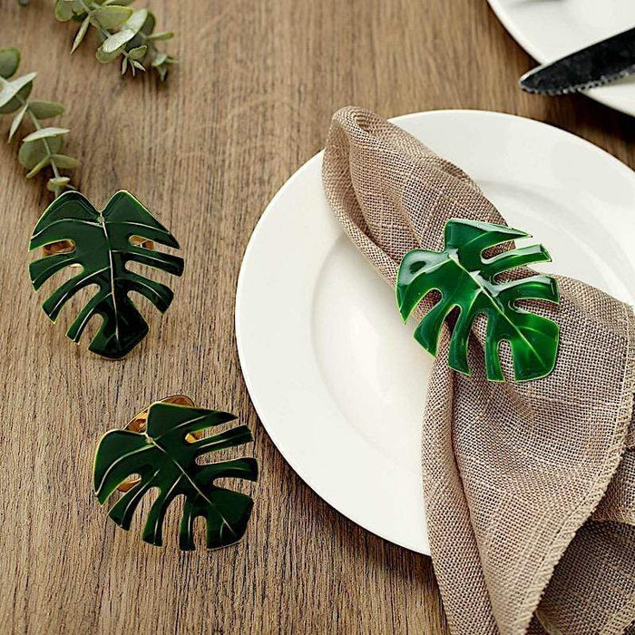 4 Metallic Napkin Rings with Tropical Leaf Design