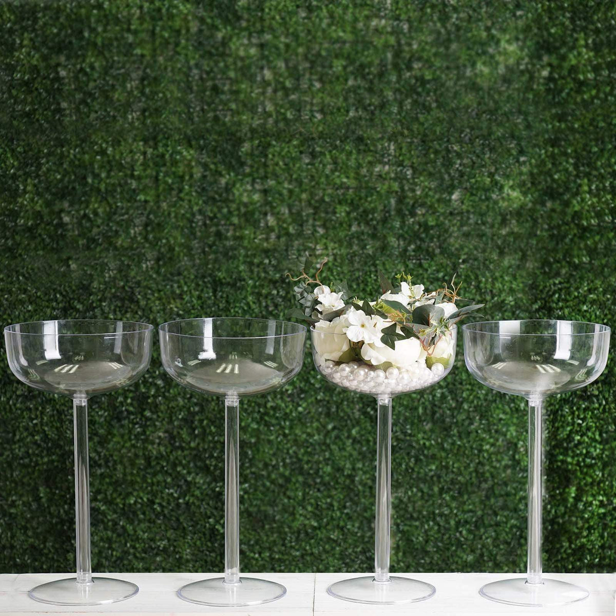 https://leilaniwholesale.com/cdn/shop/products/4-pcs-18-big-plastic-vases-cups-wedding-centerpieces-clear-prop-cupk-001-4748089786431_1200x1200.jpg?v=1630518190