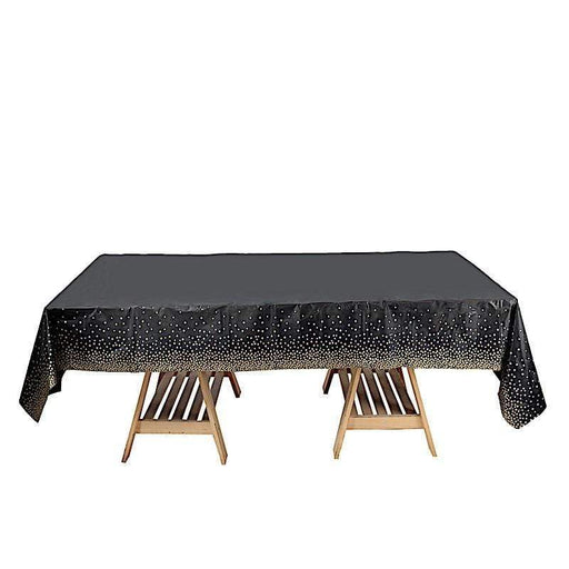 54" x 108" Rectangular Disposable Plastic Tablecloth with Confetti Dots - Black and Gold TAB_PVC_DOT03_108_BLKGD