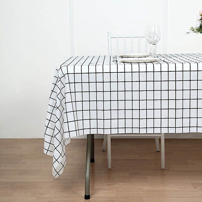 54" x 108" Rectangular Disposable Plastic Tablecloth with Grid Design - Black and White TAB_PVC_GRID01_108_WHT