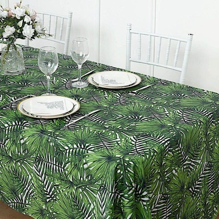 54" x 108" Rectangular Disposable Plastic Tablecloth with Tropical Leaves Design - Green TAB_PVC_TROP01_108_GRN