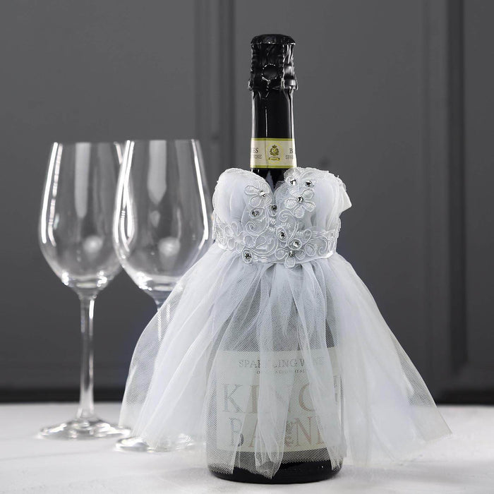 https://leilaniwholesale.com/cdn/shop/products/8-long-dress-wine-koozie-bottle-cover-with-floral-satin-ribbon-white-gob-slv-003-13926554402879_700x700.jpg?v=1630228040