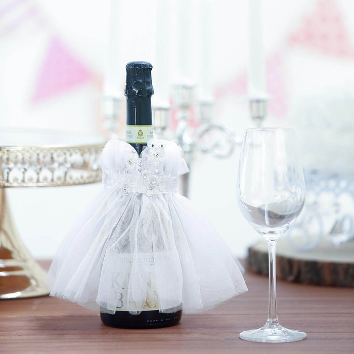 https://leilaniwholesale.com/cdn/shop/products/8-long-dress-wine-koozie-bottle-cover-with-floral-satin-ribbon-white-gob-slv-003-28525337772095_700x700.jpg?v=1630228040