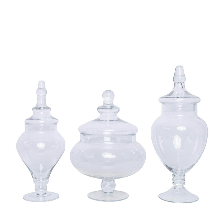 https://leilaniwholesale.com/cdn/shop/products/set-of-3-10-12-14-tall-glass-apothecary-jars-containers-with-lids-clear-glas-jar12-clr-4763736801343_700x700.jpg?v=1630041550