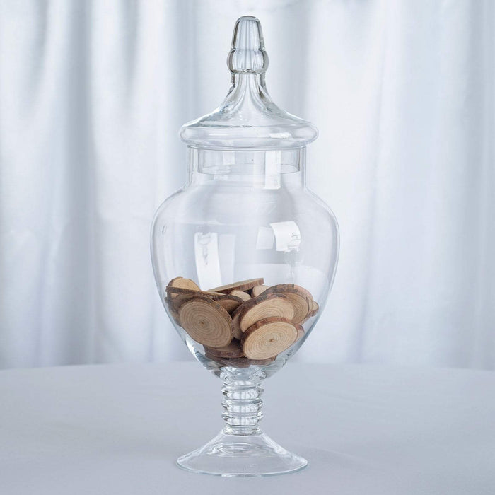 https://leilaniwholesale.com/cdn/shop/products/set-of-3-10-12-14-tall-glass-apothecary-jars-containers-with-lids-clear-glas-jar12-clr-4763739324479_700x700.jpg?v=1630041550